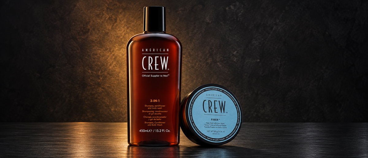American Crew haircare products in a luxury studio arrangement.