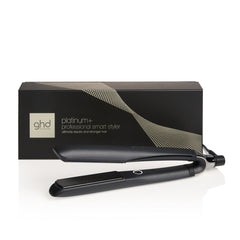 GHD Platinum+ Styler black with packaging on white background