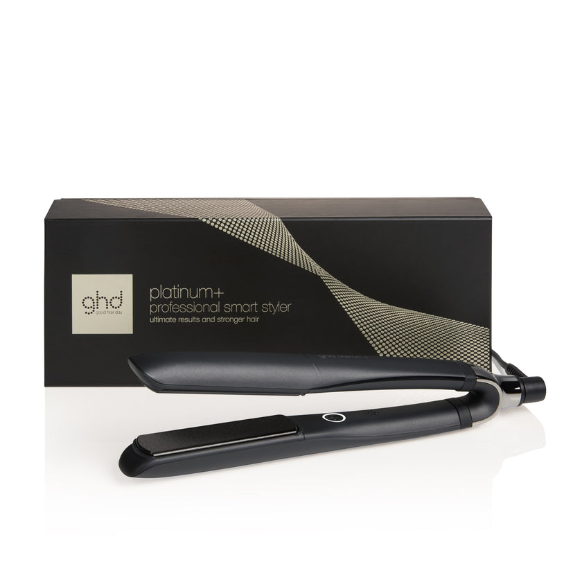 GHD Platinum+ Styler black with packaging on white background