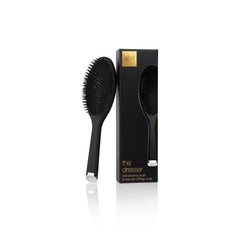 GHD The Dresser oval dressing brush with packaging on white background